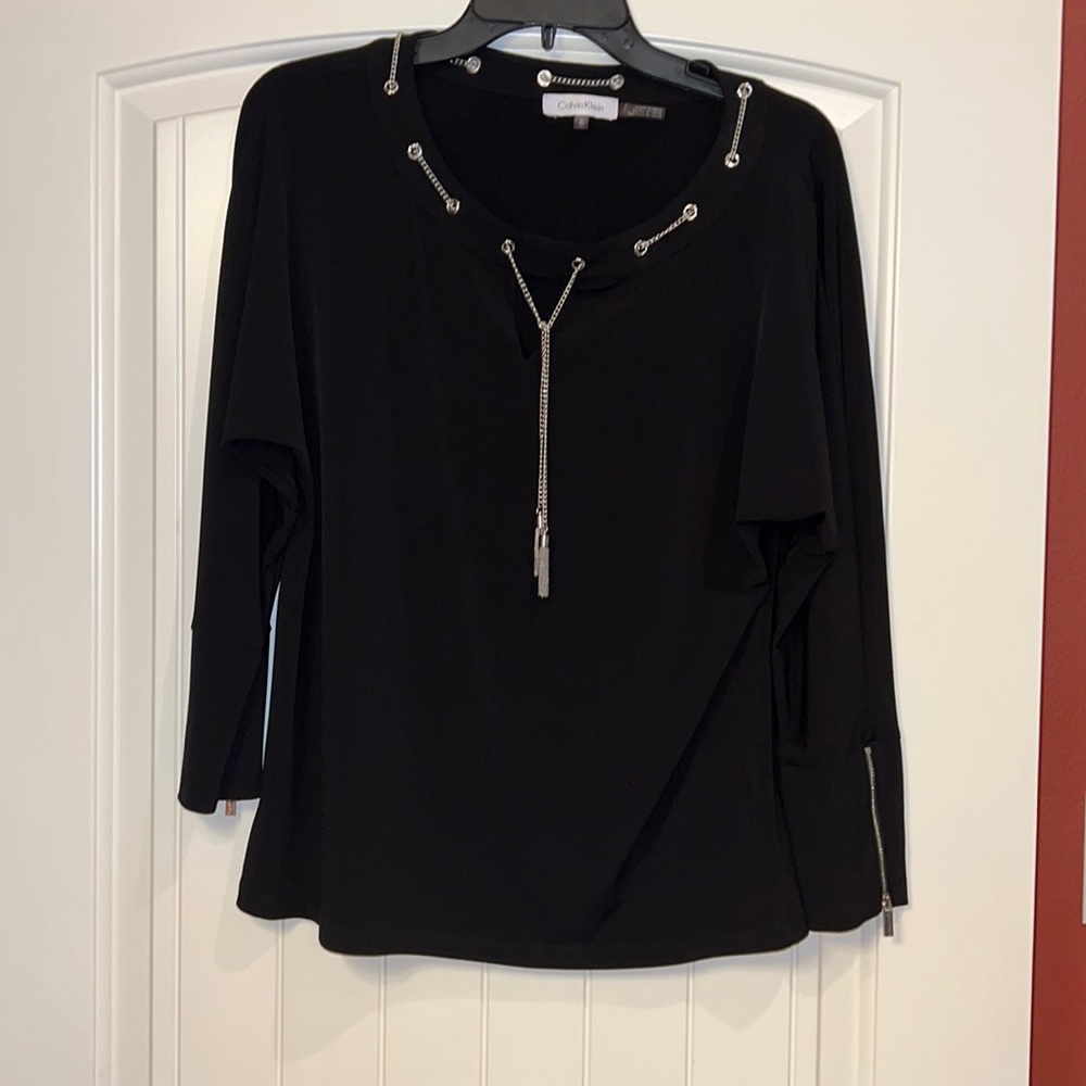 Calvin Klein black top with silver accents